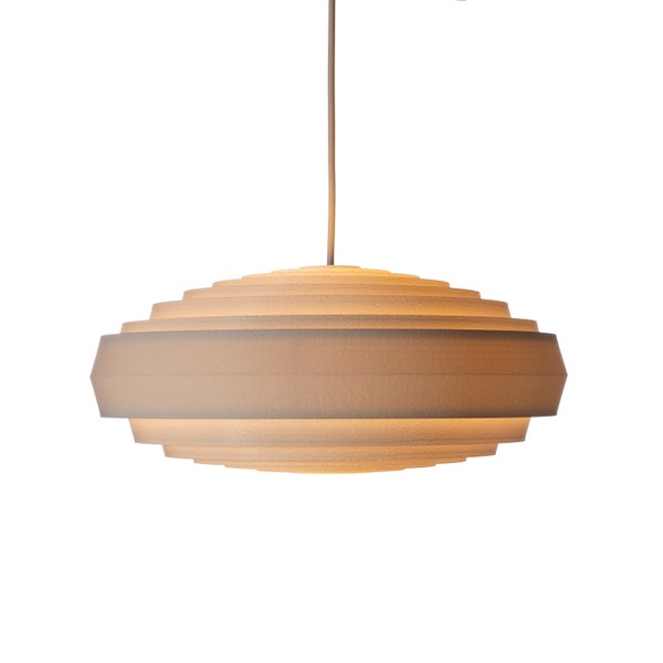 The EXPENDANT lamp by Atelier Løx, Folding pendant lamp, sustainable ECO aware design. dutch design bouclé texture surface, hanging lamp