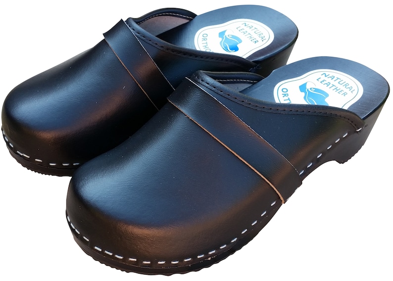 black wooden clogs