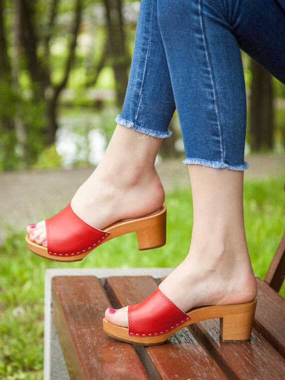 leather clogs with wooden soles