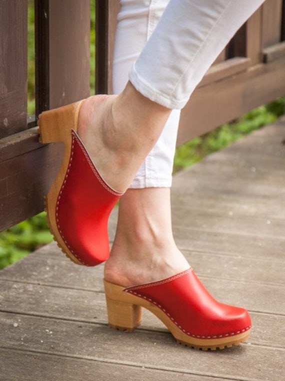 red heeled clogs