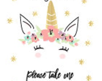 May include: A printable party favor sign featuring a cartoon unicorn with a floral crown and gold horn. The sign says "Party Favor" and "Please take one" with the text "By Print2Paper" at the bottom.