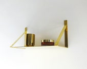 brass shelf