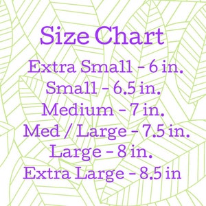 May include: A size chart with purple text on a light green leaf pattern background. Sizes include Extra Small (6 in.), Small (6.5 in.), Medium (7 in.), Med/Large (7.5 in.), Large (8 in.), and Extra Large (8.5 in.).