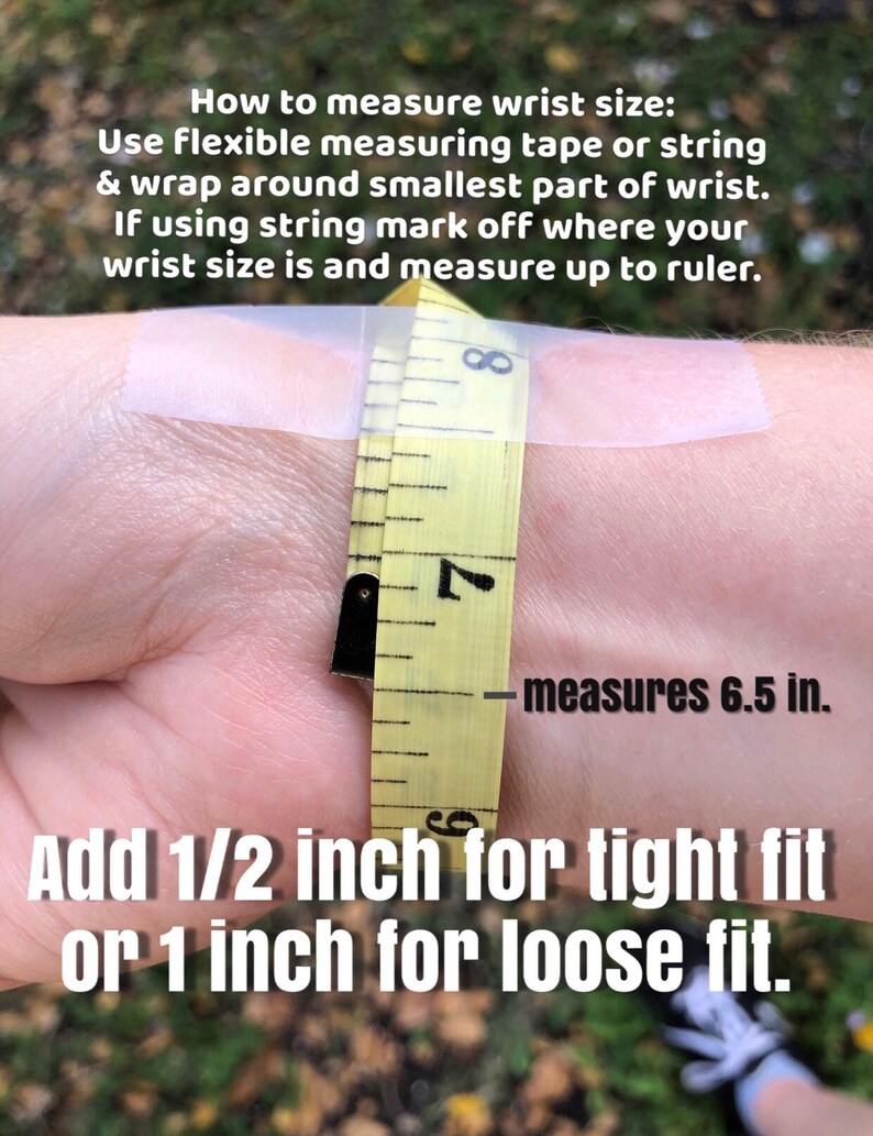 May include: A yellow measuring tape wrapped around a wrist, measuring 6.5 inches. The image includes text explaining how to measure wrist size using tape or string, and how to add inches for a tight or loose fit.