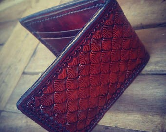 Custom handmade tooled billfold wallet with scalloped shell pattern. Made with premium Italian leather.