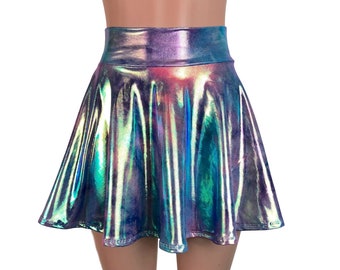 May include: A short, iridescent, pleated skirt with a high waist. The skirt is made of a shiny, metallic fabric and has a rainbow color scheme.