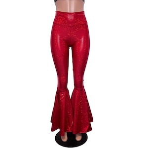 May include: Red high-waisted flared pants with a sparkly finish. The pants have a wide leg and a fitted waist.