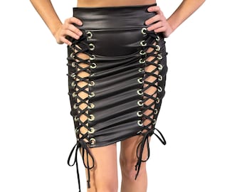 May include: Black faux leather mini skirt with gold eyelets and black laces that tie up the sides.