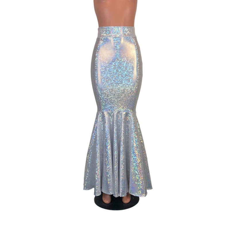May include: A silver iridescent mermaid skirt with a fitted waist and a flowing, flared bottom.