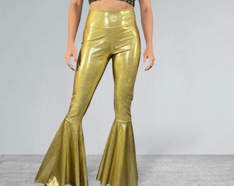 May include: Gold metallic flared pants with a high waist. The pants have a shiny, sparkly finish.