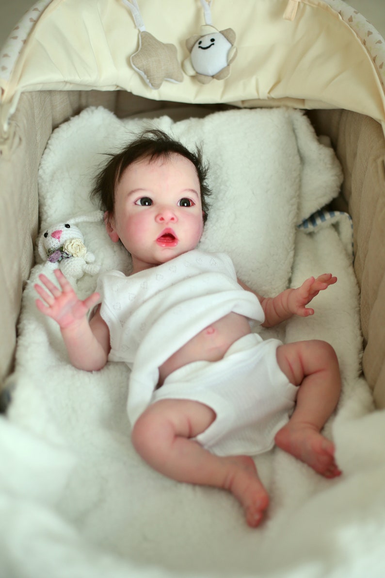 realistic newborn baby