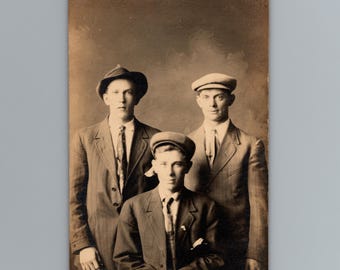 1910s Three Young Men Suits Flat Caps Studio Portrait KRUXO RPPC Vintage