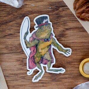 Night Circus - Ringmaster Toad Vinyl Sticker // 2.5 x 1.75&quot;