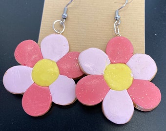 Brincos de flor rosa