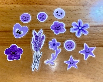 Rostos e flores - coleção de 12 adesivos roxos pintados à mão
