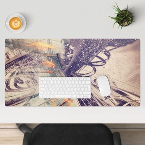 May include: Abstract art design with a white keyboard and a white mouse on a beige background. The design features a mix of geometric shapes and lines in shades of gray, white, and orange.