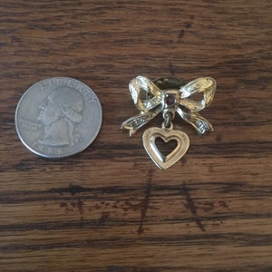 Vintage bow with heart charm pin