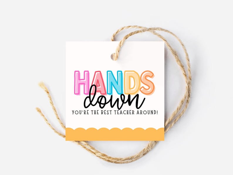 May include: A white gift tag with a colorful "Hands Down" message and the text "You're the best teacher around!" The tag has a scalloped edge and a yellow background.
