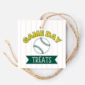 May include: White gift tag with green and yellow stripes. The tag has a baseball graphic and the text "GAME DAY TREATS".