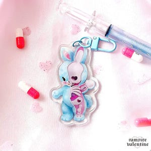 Creepy Cute Skeleton Bunny Acrylic Charm | Rabbit Oddity Art on Keychain Accessory