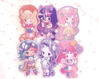 May include: A set of six die-cut stickers featuring chibi-style characters with pony-inspired features, including colorful hair, ears, and tails. The designs showcase various outfits and accessories in a pastel color palette. The text vampire valentine is visible in the bottom right corner.