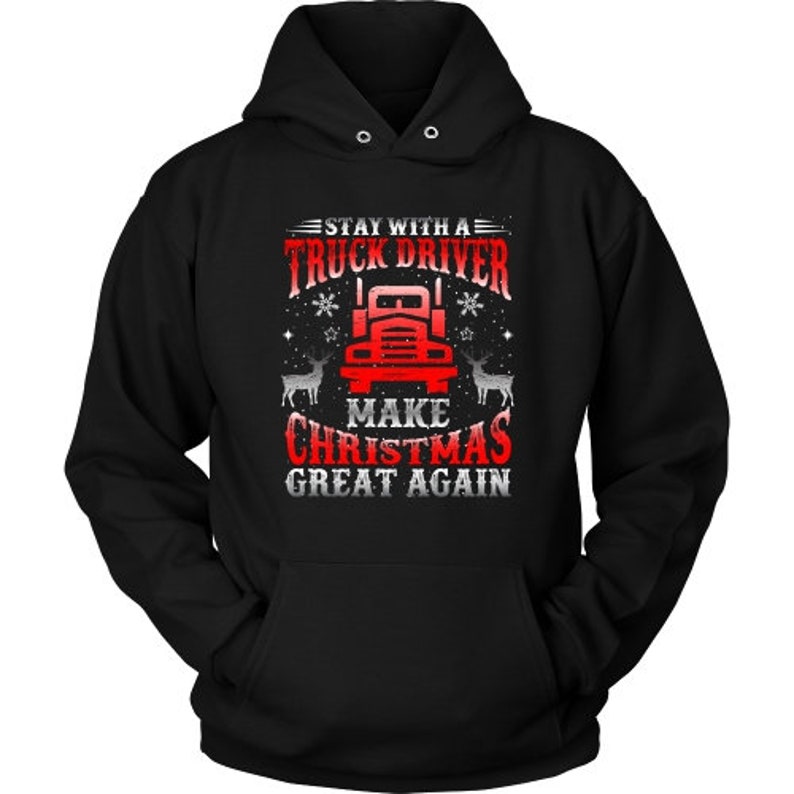 May include: Black hoodie with a white graphic print of a red semi-truck with the text "Stay with a Truck Driver Make Christmas Great Again".