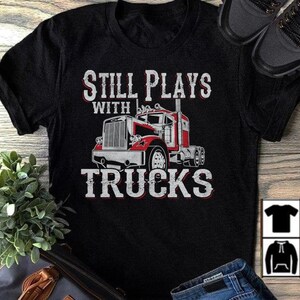 Still Plays With Trucks Premium T-Shirt, Trucker Dad, Truck Driver Dad, Trucker Daughter, Trucker Son, Trucker Dad Shirt, Trucker Gifts