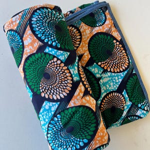 Handmade Picnic Blanket with Black Dottie Disk Pattern and Upcycled Denim Patchwork Back, Made by Refugee Women in Malawi