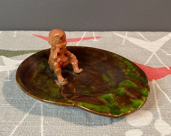 ceramic glazed ashtray | green mottled with child