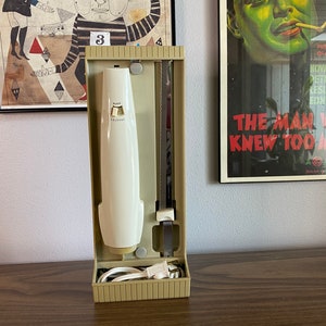 Sears electric knife | wall mountable