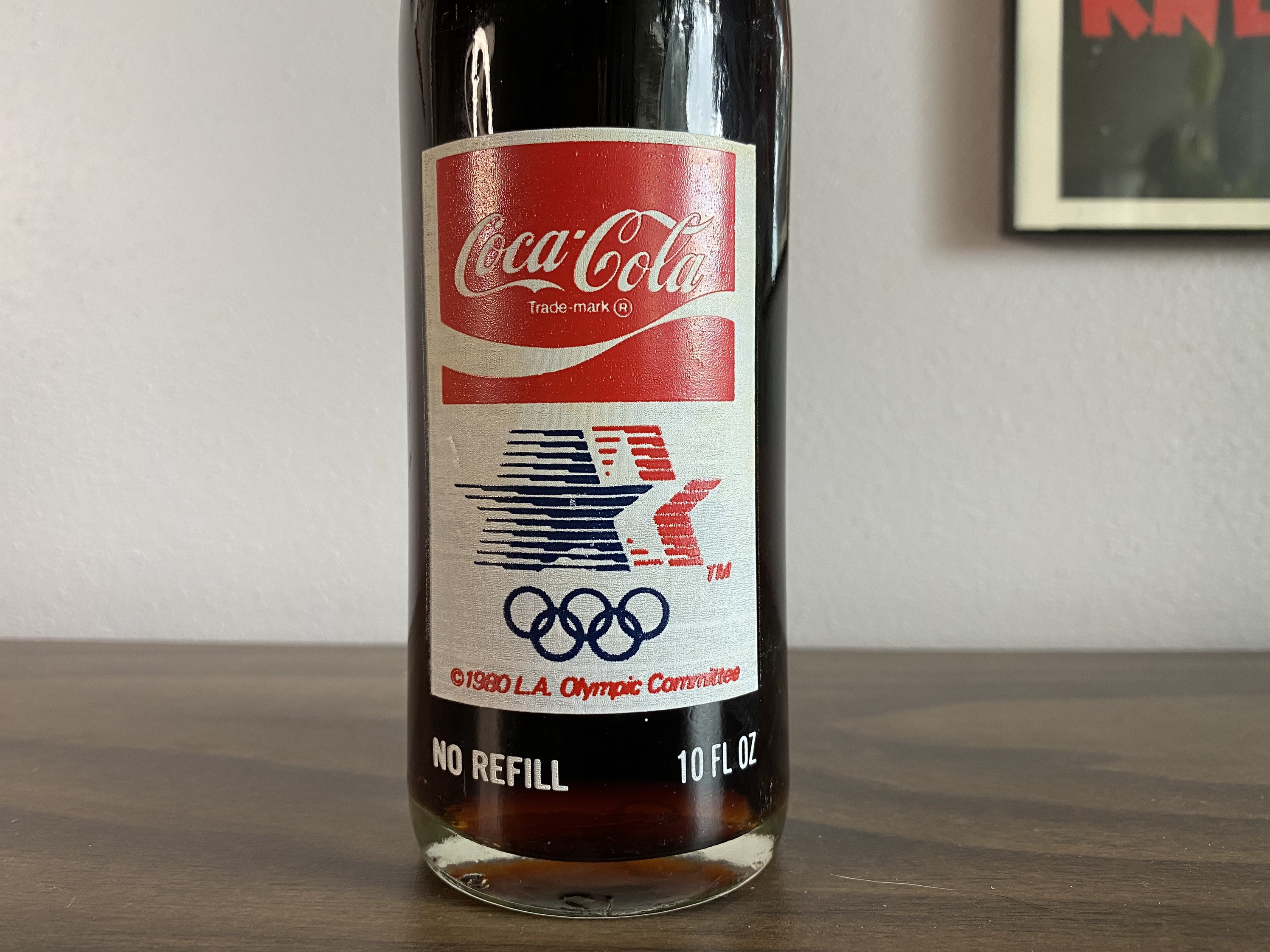 10 OZ COCA COLA COMMEMORATIVE BOTTLE - 1985 INGLES 100TH STORE OPENING