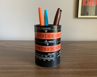 Universal Circle Metric Converter black pencil holder | ruler measures length weight area volume