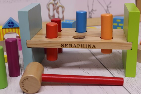 child's hammer and pegs