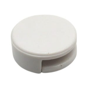 May include: White plastic cord organizer with a round shape and a slot for holding cords.