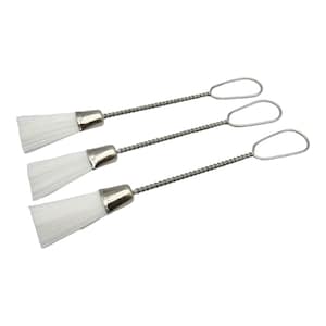 May include: Three white cleaning brushes with metal handles and loops. The brushes are made of soft bristles and are ideal for cleaning small spaces.