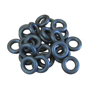 May include: A pile of black rubber O-rings. The rings are all the same size and are arranged in a random pattern.
