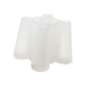 May include: A white plastic four-pronged bottle stopper.