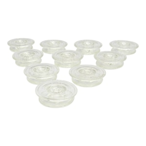 May include: A collection of eleven clear glass insulators, each with a circular design and a central indentation. The insulators are arranged in a triangular pattern against a white background, showcasing their transparent quality.