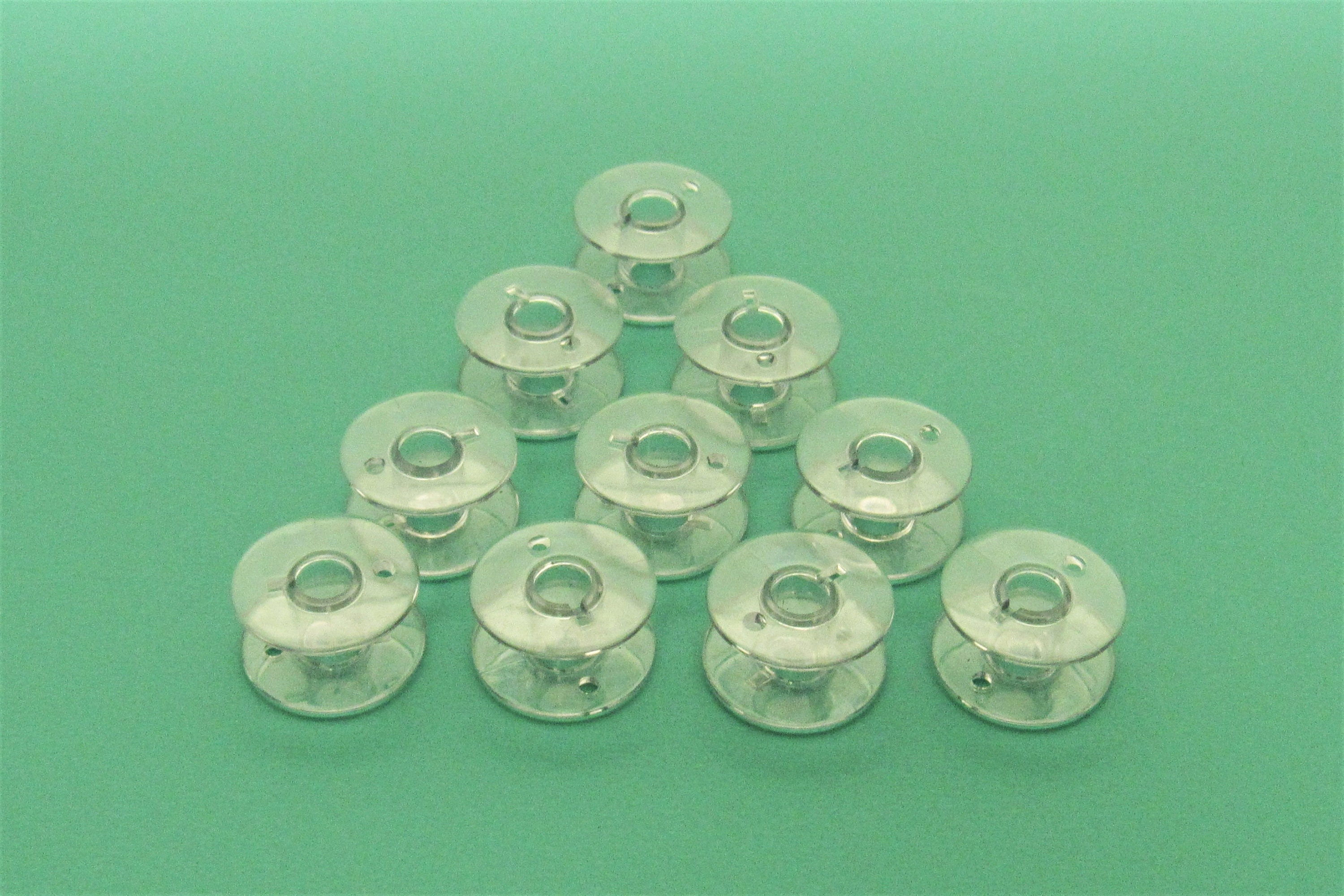 Sa156 Style Rainbow Bobbins 12 Pack With Plastic Case Sa156 Style Rainbow Bobbins 12 Pack With Plastic Case