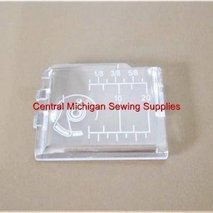 Bobbin Cover / Slide Plate - Fits New Home Janome Models 3018, 3023, 3123, MC8000, # 830302002