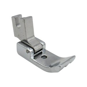 May include: A silver sewing machine foot with a hinged, adjustable guide. The foot has a textured bottom and a small hole in the centre.