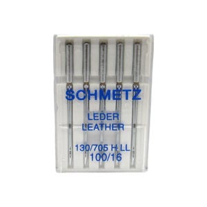 May include: A pack of five silver sewing needles for leather, labeled "Schmetz Leder Leather 130/705 H LL 100/16".
