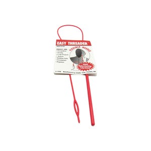 May include: Red plastic needle threader with a flexible needle. The packaging says "Easy Threader Flexible Needle" and lists uses for the product, including sweatshirts, jackets, bathing suits, sweatpants, and pajamas.