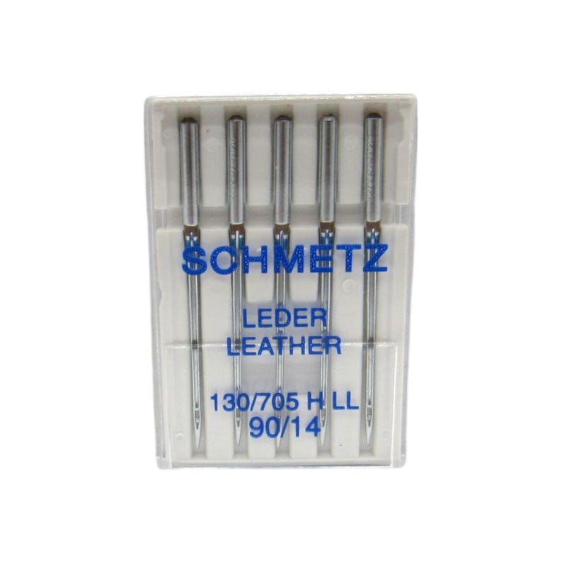 May include: A pack of five silver sewing needles in a clear plastic case. The needles are labeled "SCHMETZ LEDER LEATHER 130/705 H LL 90/14".