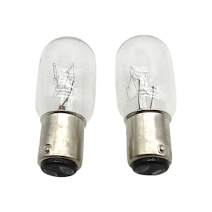 May include: Two clear glass light bulbs with silver metal bases. The bulbs have a single filament inside.