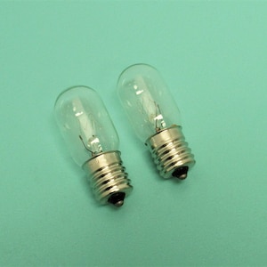 2 New 15 watt,  120 volt, medium glass, clear, 5/8 base, screw in style bulb