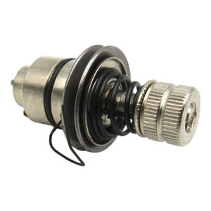 May include: A silver sewing machine bobbin winder with a black rubber ring and a spring. The winder has a threaded knob on the top.