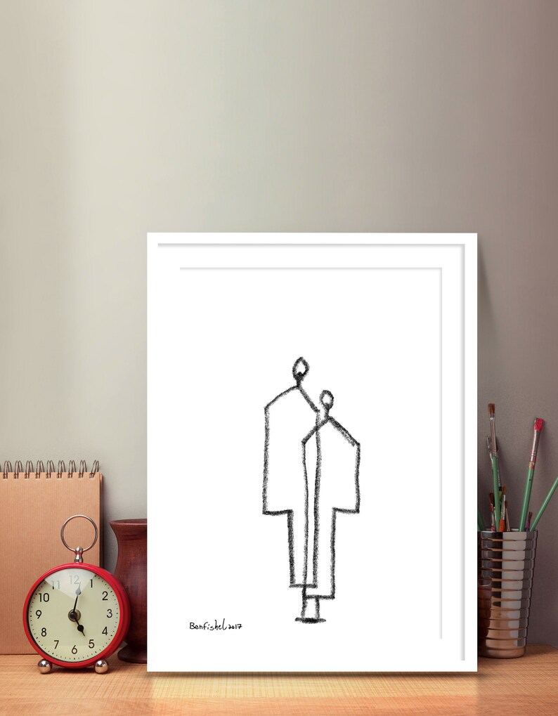 May include: A black and white line drawing of two figures standing side by side. The drawing is framed in a white frame and signed "Banfischel 2017" in the bottom left corner.