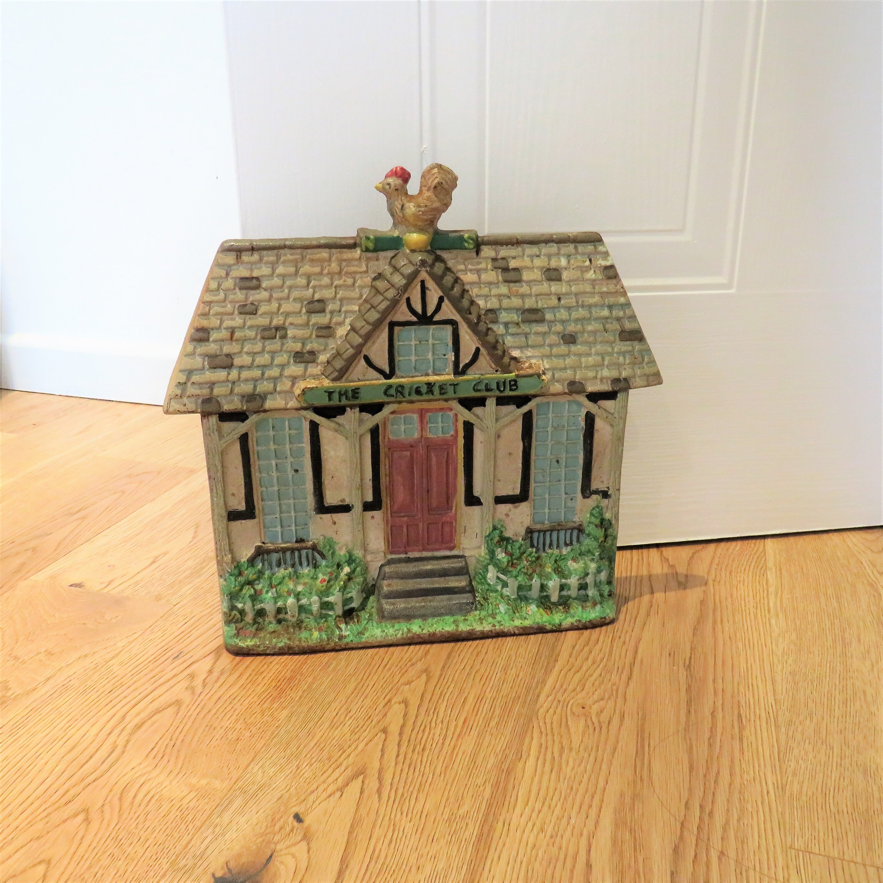 Vintage Old Cast Iron Cottage House Doorstop Cricket Club House Door