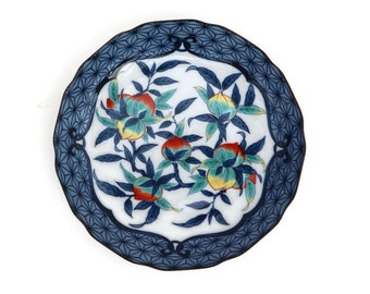 Oriental Decorative Porcelain Plate With Hand Painted Peaches and Geometrical Decoration .